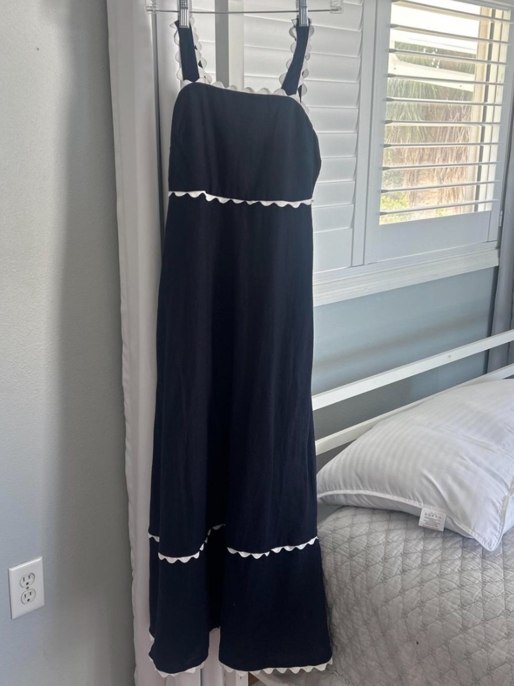 Navy blue dress with adjustable button straps